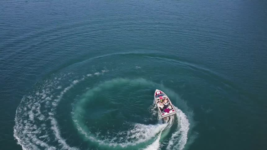 People Riding In Boat On Lake Aerials