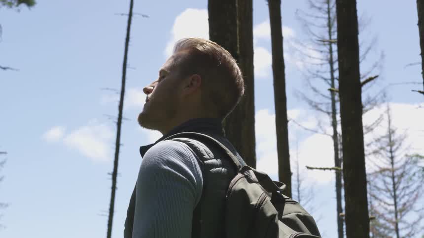 Photographer Hiking In Nature