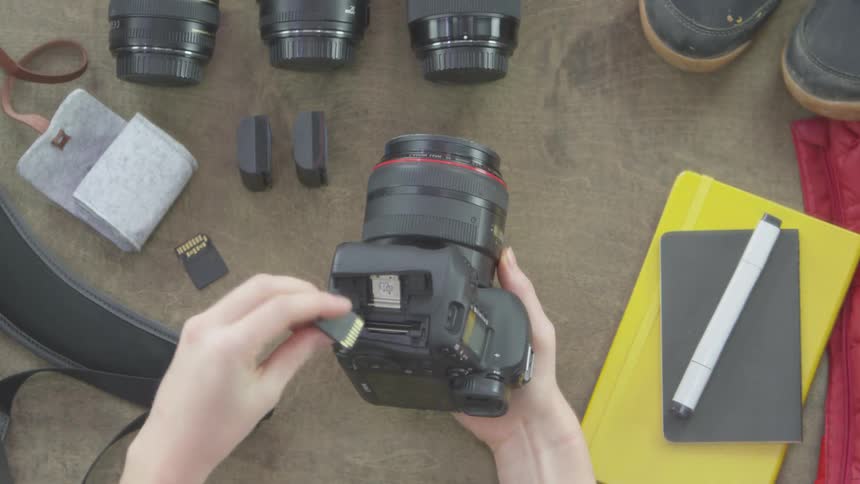 Photographer Packing Equipment