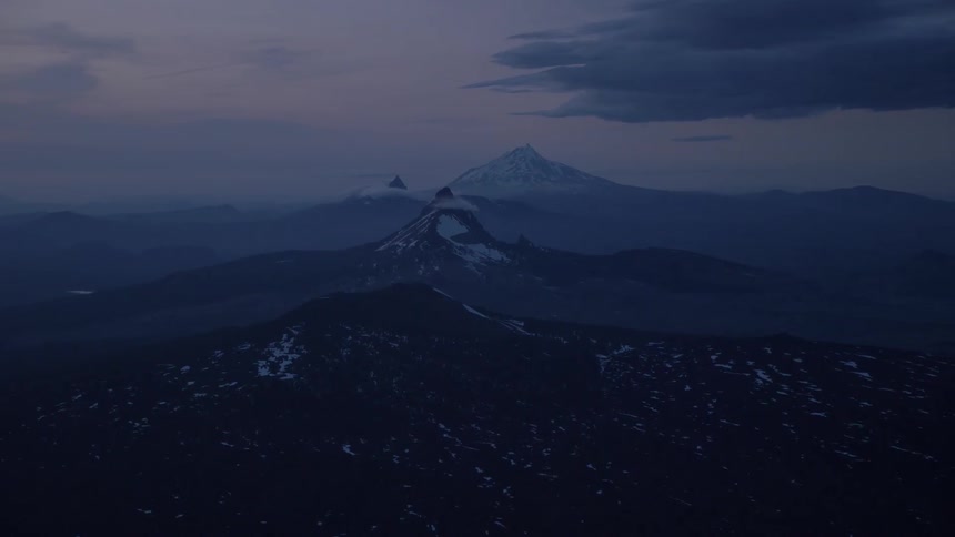 Pilot Flying Plane Through Snowy Mountains