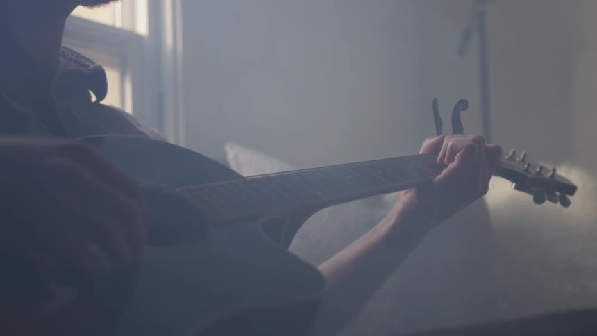 Musician In Small Apartment In New York City