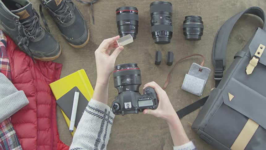 Photographer Packing Equipment
