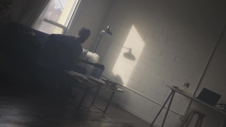Musician In Small Apartment In New York City