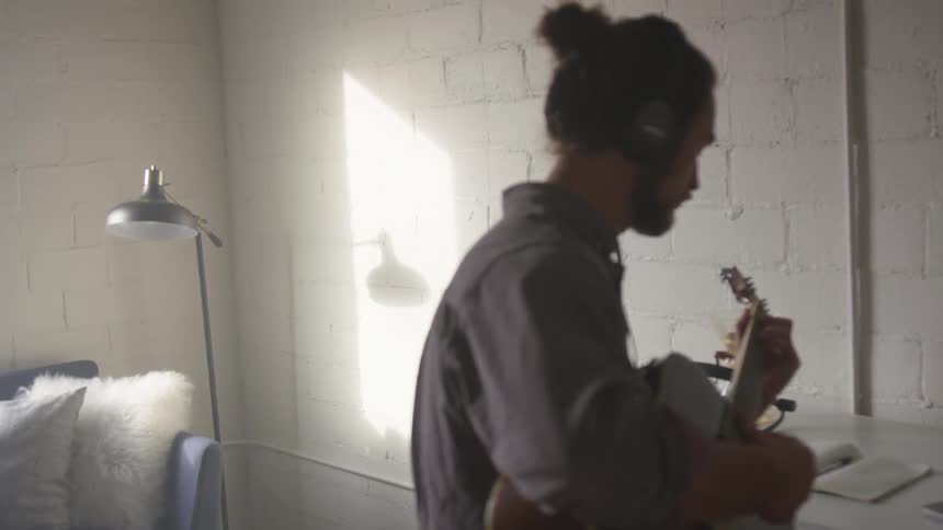 Musician In Small Apartment In New York City