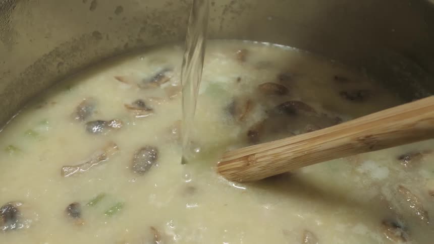 Person Making Food In The Kitchen