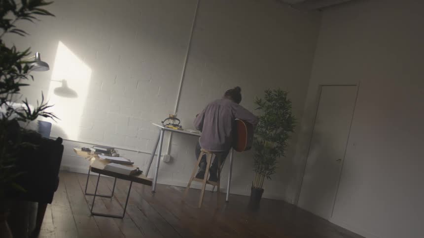 Musician In Small Apartment In New York City