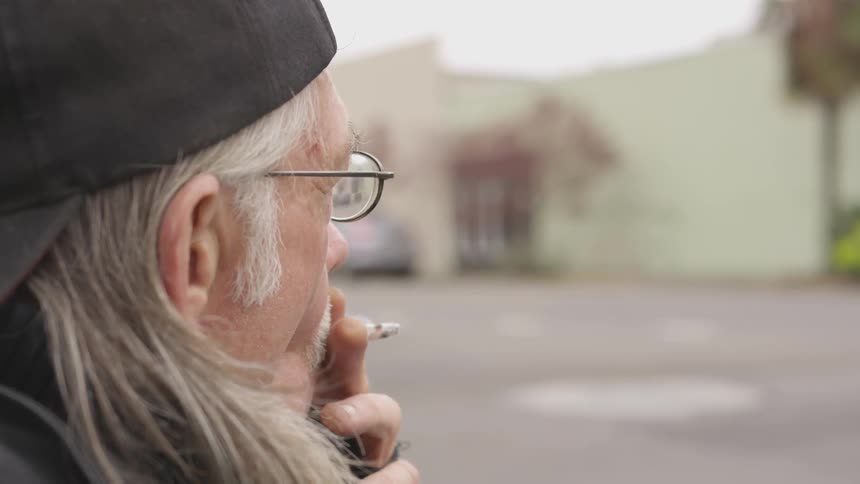 Musician Playing And Smoking