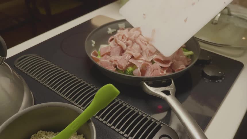 Person Making Food In The Kitchen