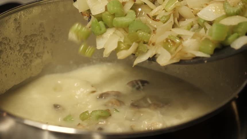 Person Making Food In The Kitchen