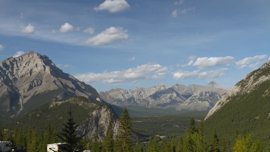 Time lapse of clouds moving over a mountain range