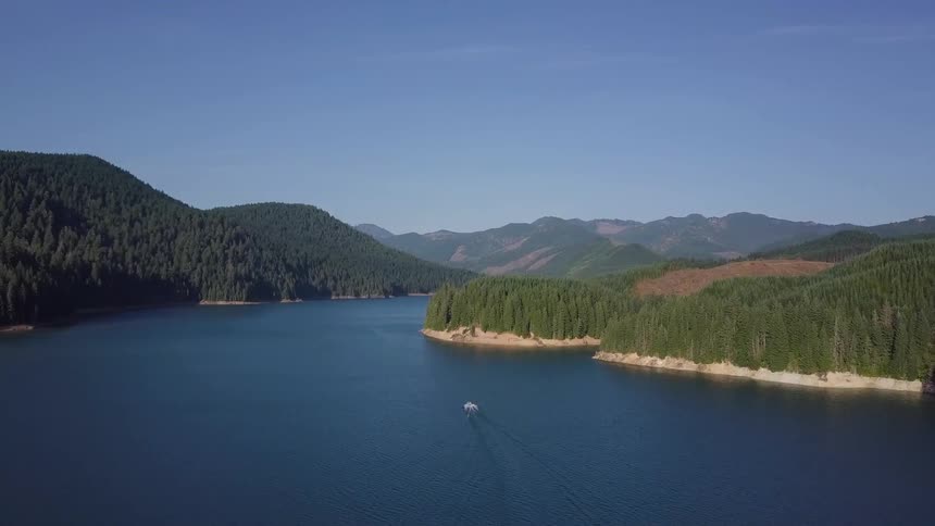 People Riding In Boat On Lake Aerials