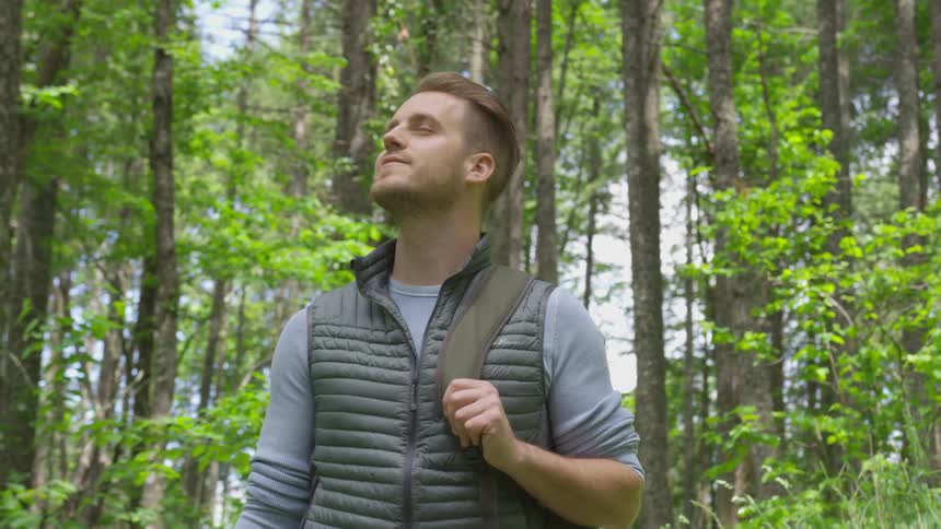 Photographer Hiking In Nature