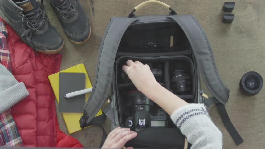 Photographer Packing Equipment