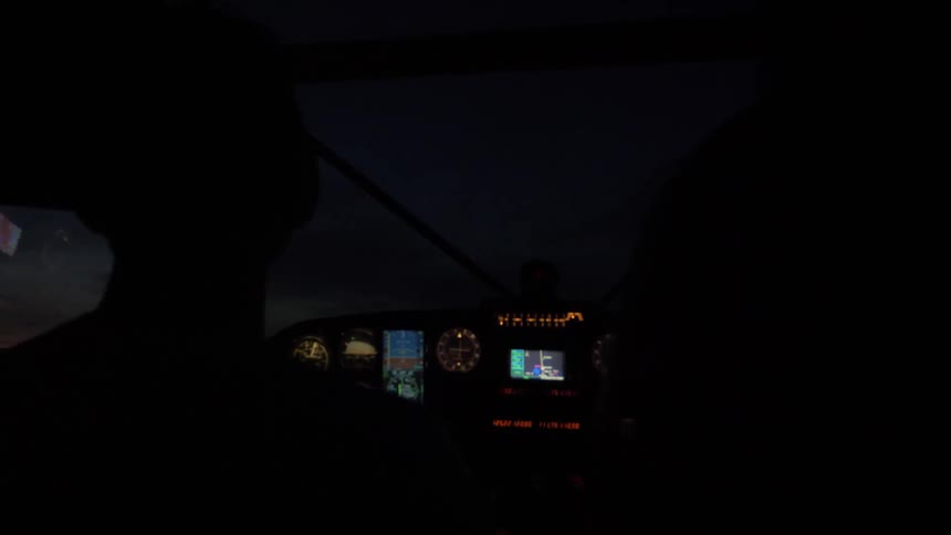 Pilot Flying Plane Through Snowy Mountains