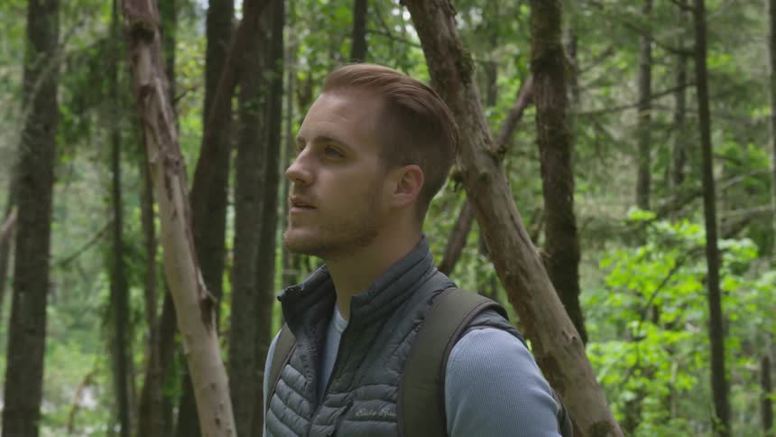 Photographer Hiking In Nature