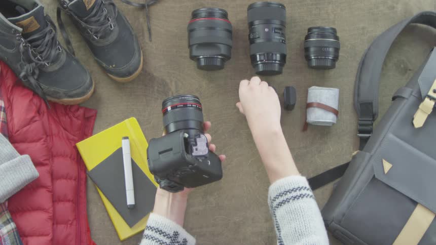 Photographer Packing Equipment