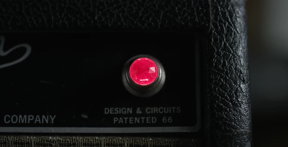 A red light flashing on and off on a piece of equipment