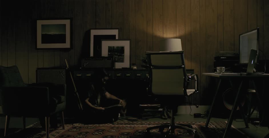 A timelapse of a woman in her living room
