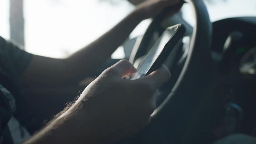 Man On Phone While Driving