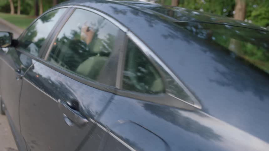 Man On Phone While Driving