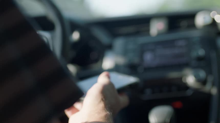 Man On Phone While Driving
