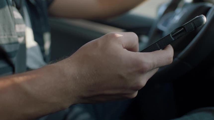 Man On Phone While Driving