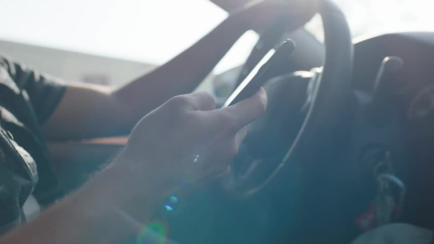 Man On Phone While Driving