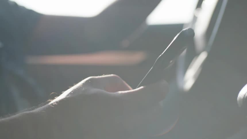 Man On Phone While Driving