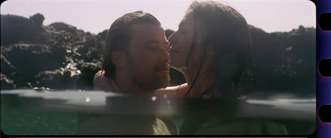 Couple kissing in the water