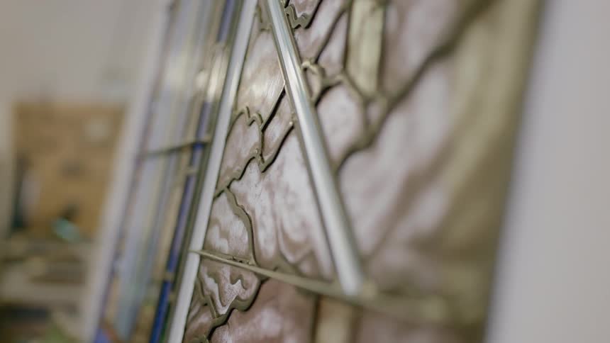 Up close of design of artwork in studio