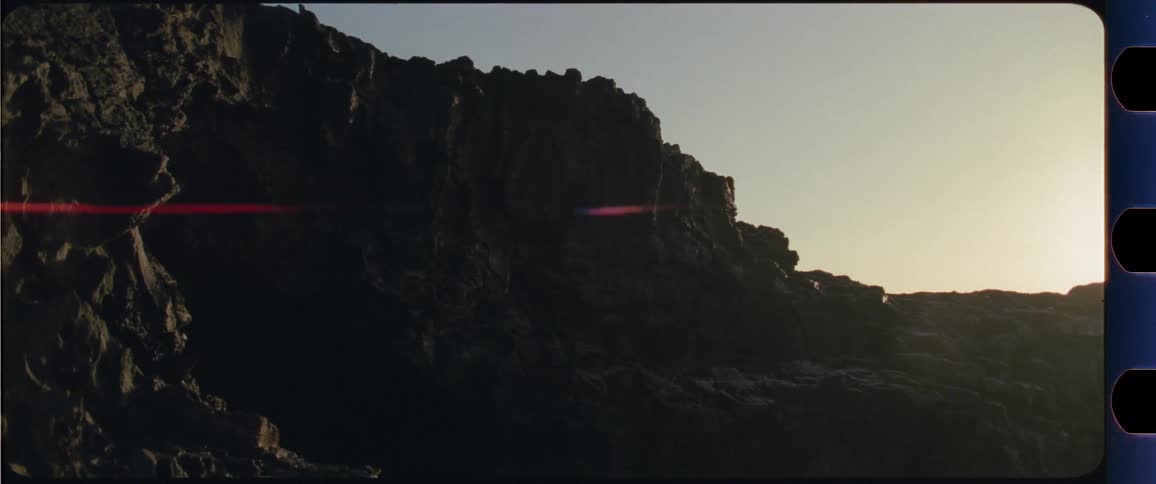 Man jumping off a cliff