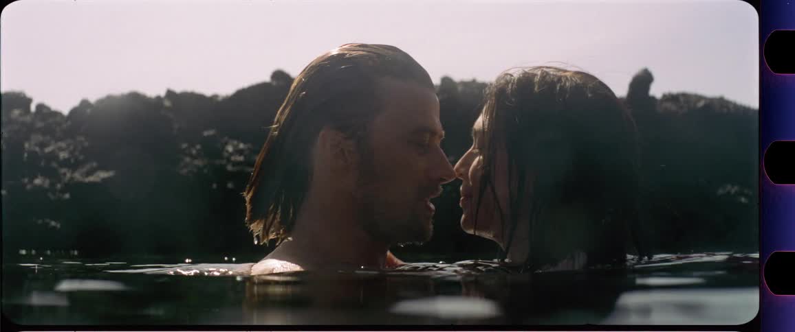Couple kissing in the water