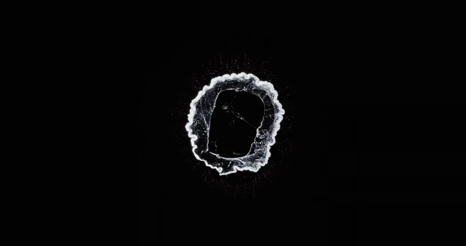A drop of metallic ink forms a cell pattern and compresses