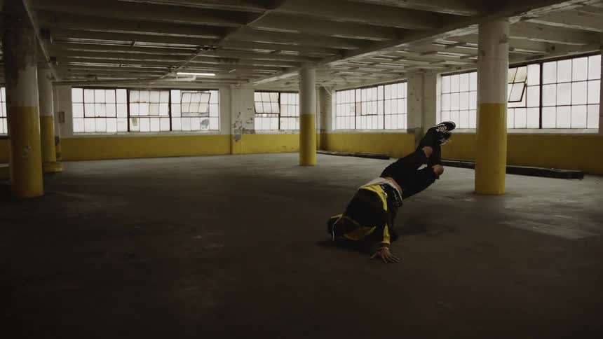 People Dancing In Abandoned Warehouse