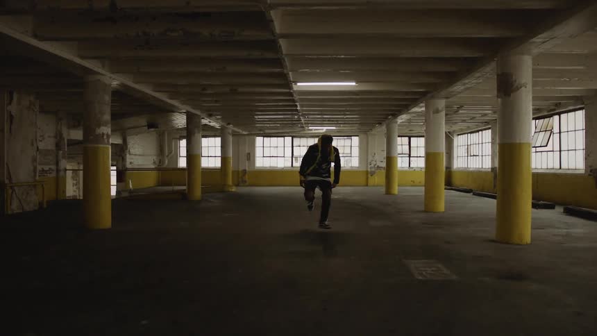 People Dancing In Abandoned Warehouse