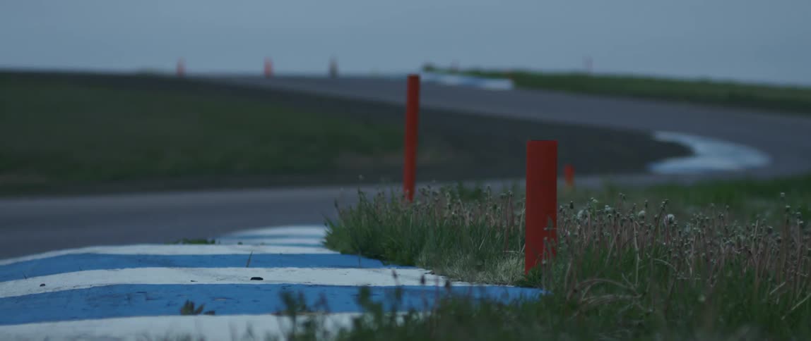 Red curve cones on a curve at a race track
