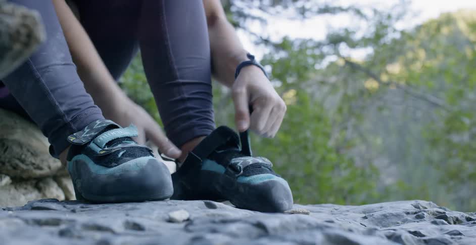Woman Rock Climbing In Nature