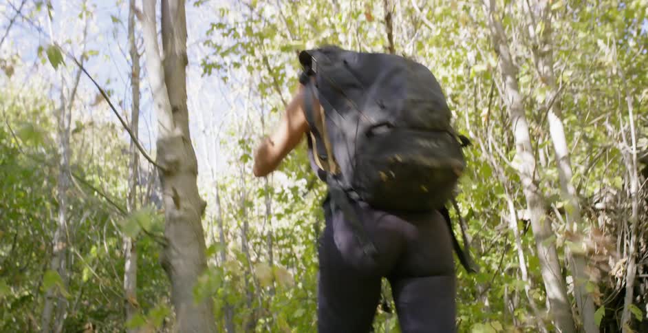 Woman Rock Climbing In Nature