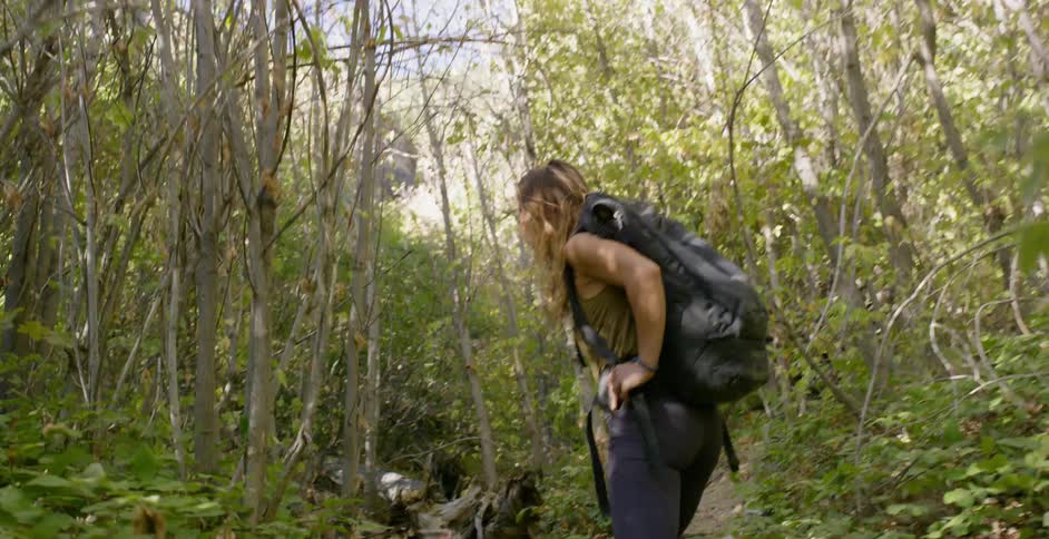 Woman Rock Climbing In Nature