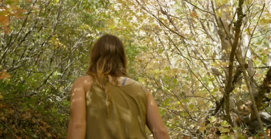 Woman Rock Climbing In Nature