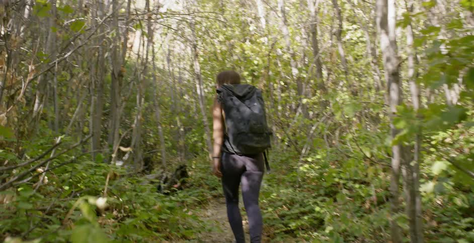 Woman Rock Climbing In Nature