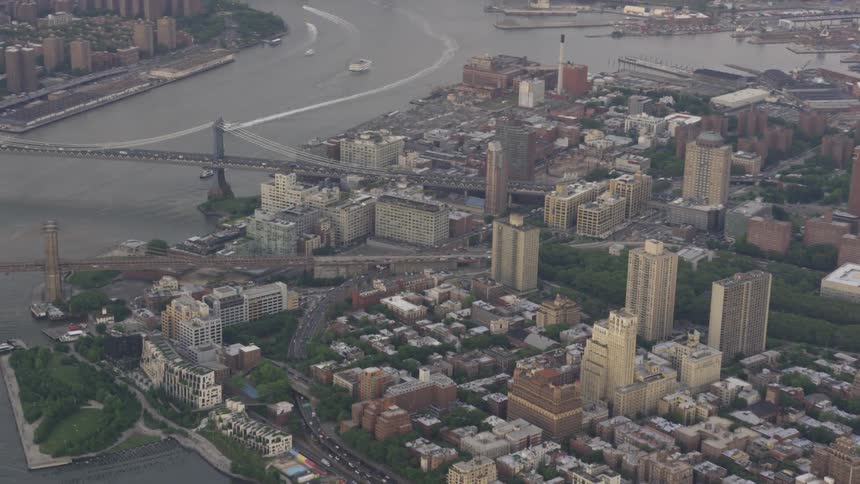 Crowded city blocks separated by river
