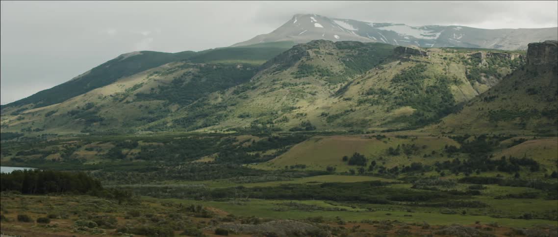 View of brushy mountains on a cloudy day