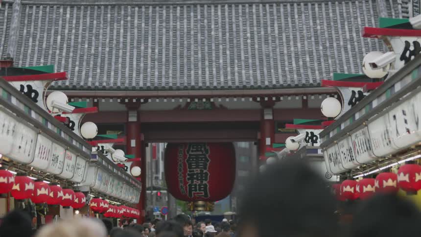 People walking in an asian marketplace
