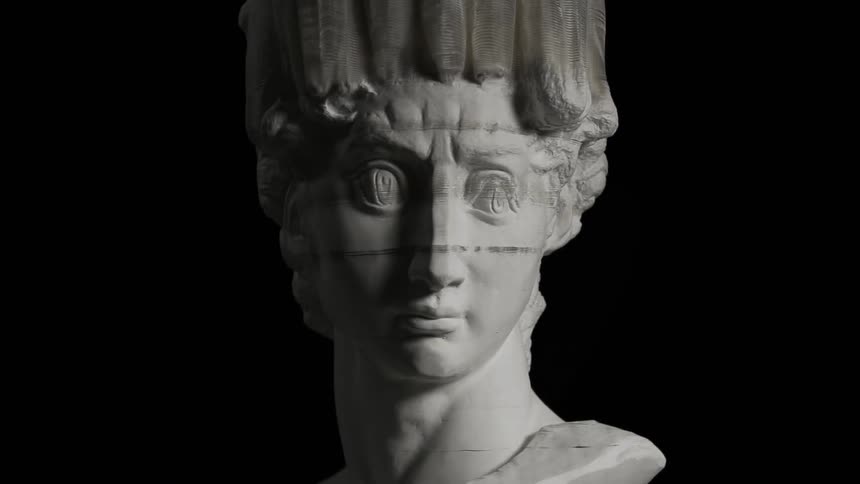 An ancient greek bust is stretched and pulled