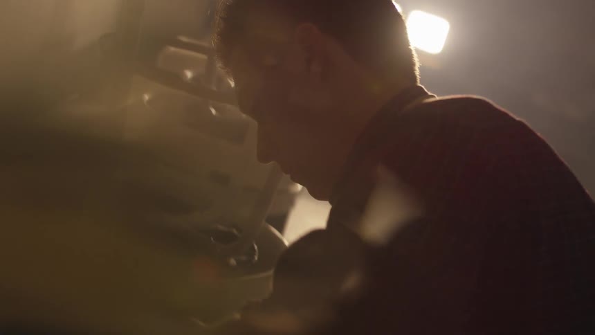 A man is in a workshop