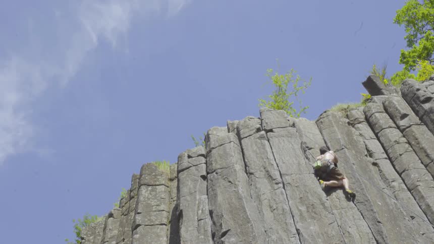 A man rock climbing outdoors