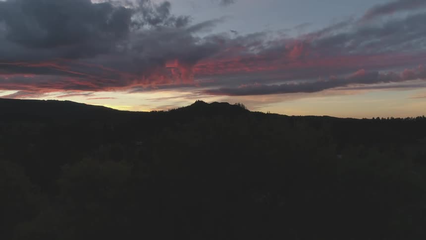 The sun is setting in the horizon