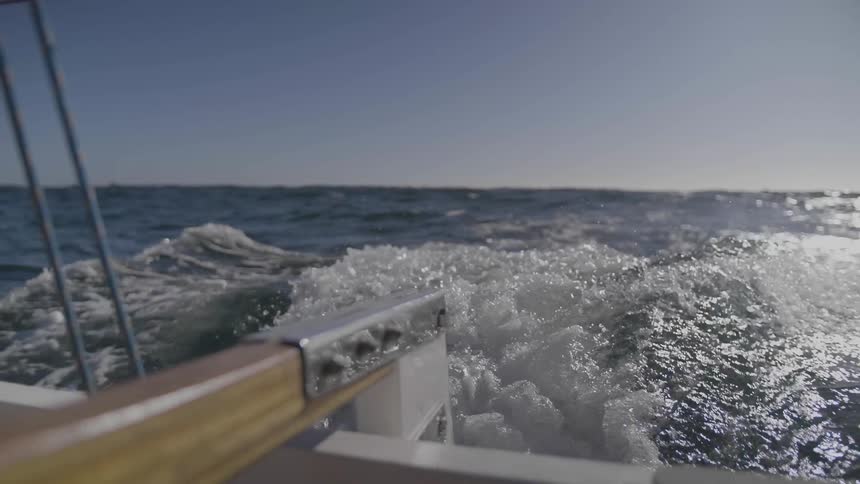 A boat driving in the ocean
