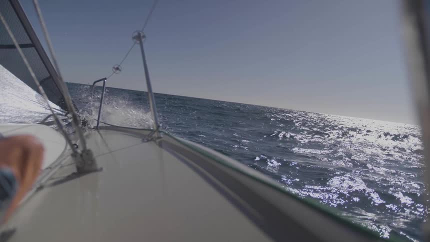 A person sailing on a boat on the ocean